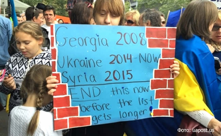 В Нью-Йорке уже начались протесты против приезда Путина в США United Nations 2015